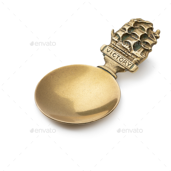 Vintage brass English Tea caddy spoon on white background - Stock Photo - Images