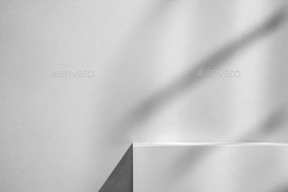 Grey minimal background with podium and shadows for product display and demo - Stock Photo - Images