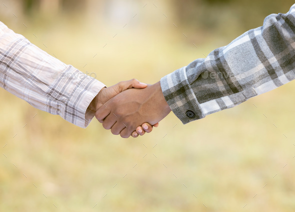 Handshake, thank you and shaking hands outdoor of agriculture b2b partnership with teamwork. Welcom - Stock Photo - Images
