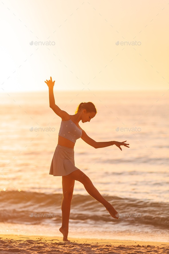 Beautiful teen girl on the beach during summer vacation  - Stock Photo - Images