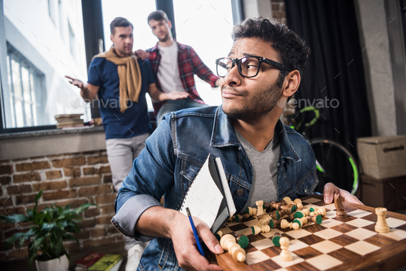 Young Man Playing Game of Chess Online with Friend, Stock Video - Envato  Elements