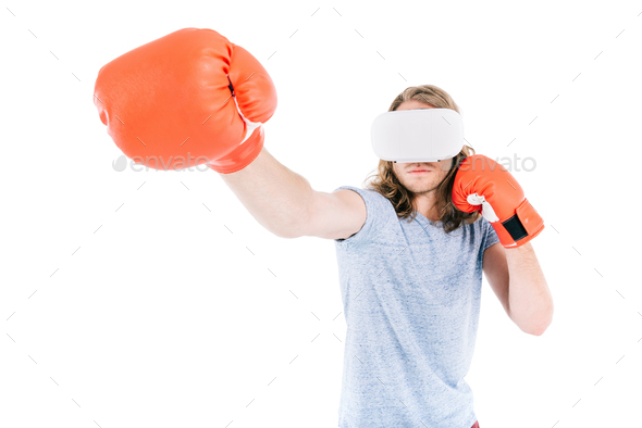 handsome young man in virtual reality headset boxing isolated on white - Stock Photo - Images