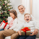 grandfather and adorable little kids with christmas gifts at home - PhotoDune Item for Sale
