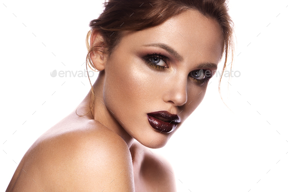 The beauty with creative cosmetics. Clean smooth bright skin. Full cherry lips, ideal eyebrows - Stock Photo - Images