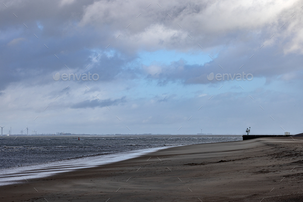 Beautiful sea view with waves on the beach of Breskens - Stock Photo - Images