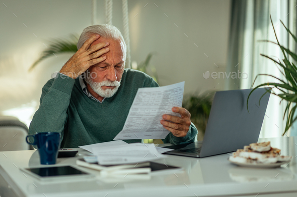 How am I going to pay all these bills? - Stock Photo - Images