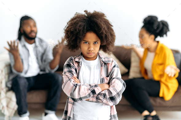 Difficulties in the family. An African American unhappy preschool girl ...