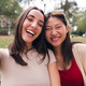 selfie photo of two happy young women laughing - PhotoDune Item for Sale