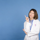 Asian doctor pointing up to a blank space - PhotoDune Item for Sale