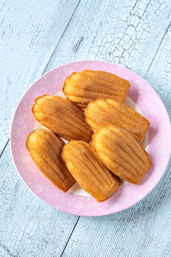 Madeleines - French small sponge cakes - Stock Photo - Images