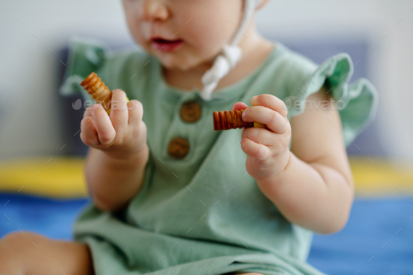 Girl Playing with Wooden Toys - Stock Photo - Images