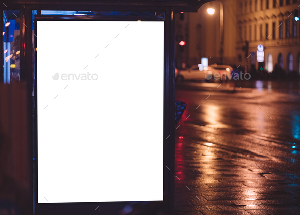 Bus stop during night with ad space