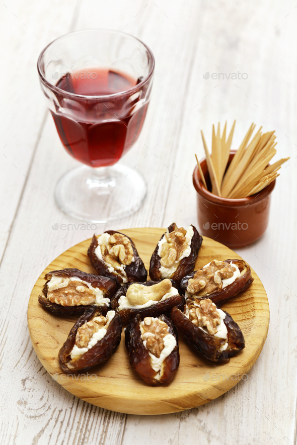 stuffed dates with cream cheese and nuts - Stock Photo - Images