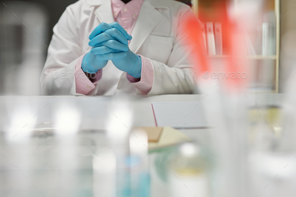 Laboratory Worker Sitting at Desk - Stock Photo - Images