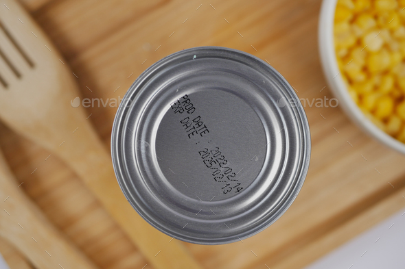 expire date on food can on white background ,