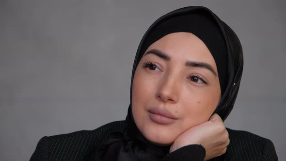 Thoughtful Concerned Business Young Muslim Woman in Hijab Looking Away Thinking Solving Problem