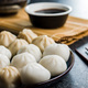 Xiaolongbao, traditional steamed dumplings. Xiao Long Bao buns on plate. - PhotoDune Item for Sale