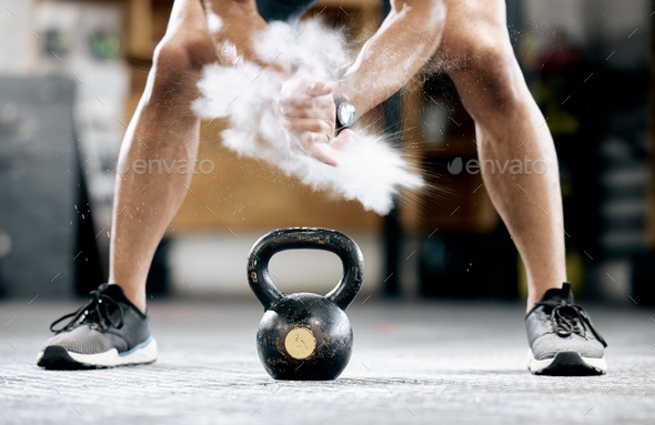 Fitness, start or hands with a kettlebell for training, workout or exercise with chalk or powder fo