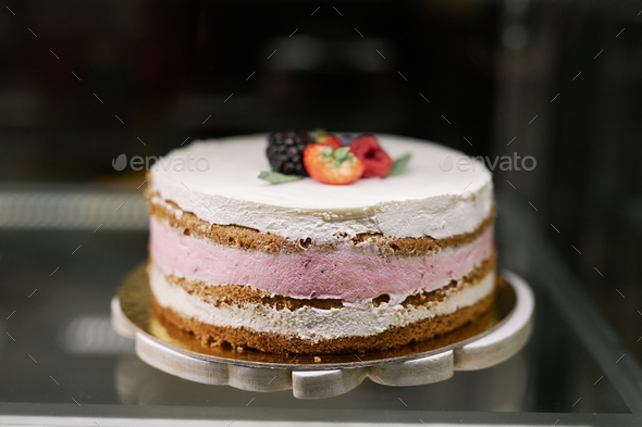Cake with Pink and White Frosting - Stock Photo - Images