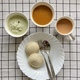 Top view of a serving of idly with sambar, coconut chutney and tea - PhotoDune Item for Sale