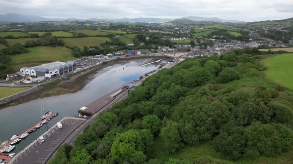 Bantry town in south west County Cork, Ireland reveal over trees aerial drone view alt