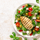 Grilled chicken fillet and fresh green leafy vegetable salad with tomatoes, red onion, olives - PhotoDune Item for Sale