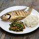 fried fish(Tilapia), ugali(white maize flour mash) and Sukuma Wiki(kale stew), Kenyan food - PhotoDune Item for Sale