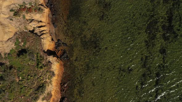 AERIAL DIRECTLY ABOVE Limestone Cliffs Along Australian Coastline alt