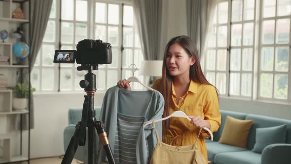 Girl Fashion Blogger Or Woman Showing Casual Colourful Shirts On Camera For Sell Online alt