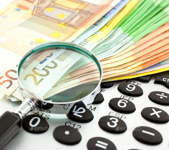 Euro Notes with calculator and magnifier - Stock Photo - Images