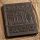 Unpacked Chinese tea brick from the Hubei Province close up on package paper - PhotoDune Item for Sale