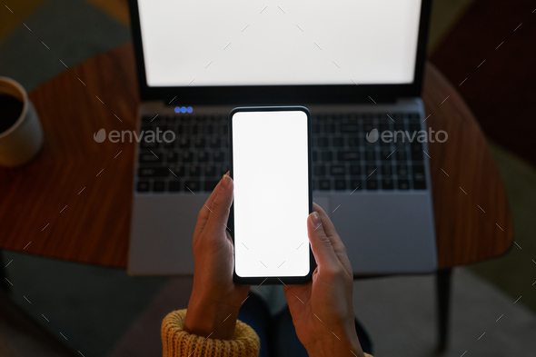 Top view closeup young woman using laptop and smartphone mockups - Stock Photo - Images