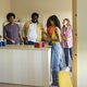 Group of diverse young people partying at home playing around having fun - PhotoDune Item for Sale