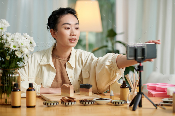 Woman Filming Video on Making Soap - Stock Photo - Images