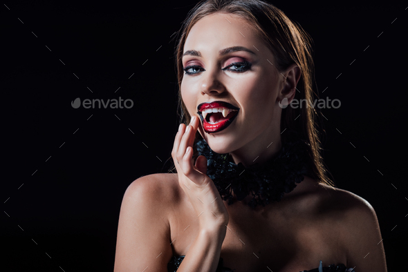 Naked Scary Vampire Girl Showing Fangs Isolated On Black Stock Photo By