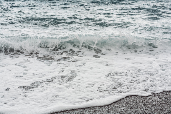 sand beach with waves in summer