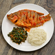 Tilapia stew, ugali(white maize flour mash) and Sukuma Wiki(kale stew), Kenyan food - PhotoDune Item for Sale