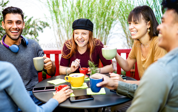 Diverse people group drinking latte at coffee bar garden - Stock Photo - Images