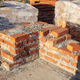 Bricks masonry with cement on concrete foundation, process of house building - PhotoDune Item for Sale