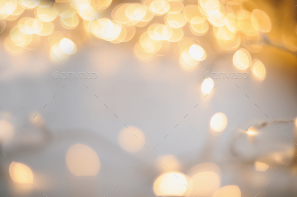 abstract shiny gold background. blured bokeh glowing golden background ...