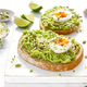 Avocado toast with boiled egg, seeds and sprouts on white background. Healthy diet food - PhotoDune Item for Sale