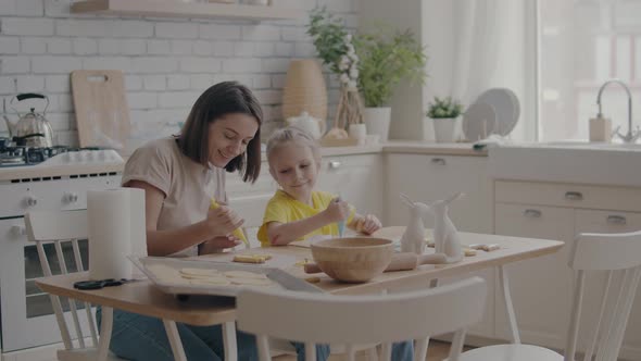 Family with Child Cooking in the Kitchen