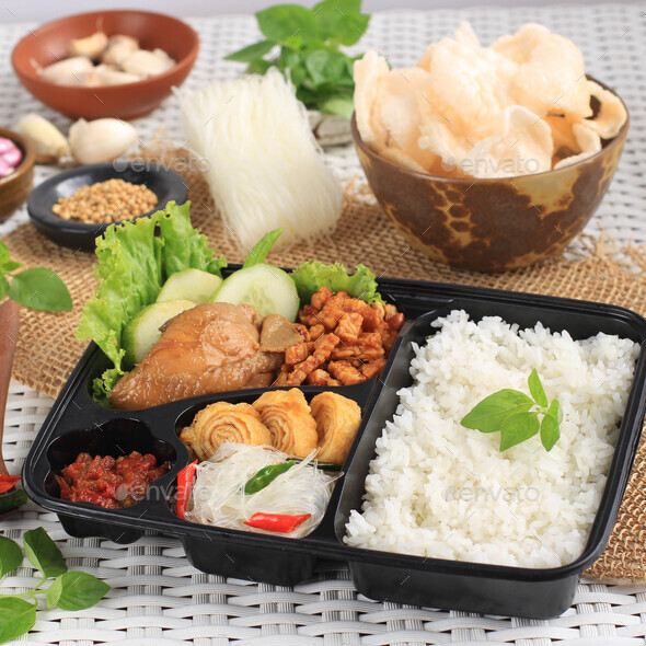 Rice Box or Indonesian Nasi Kotak with Soy Sauce Chicken, Oreg Tempeh, and Spicy Paste