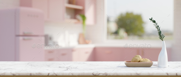 Copy space on white marble tabletop in beautiful pastel pink