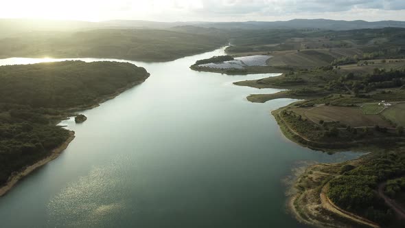 Lake View And Solar Panels On The Field alt