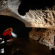 Cave explorer, speleologist exploring the underground - PhotoDune Item for Sale