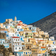 Hillside colorful homes in the old tradition village Olympos - PhotoDune Item for Sale