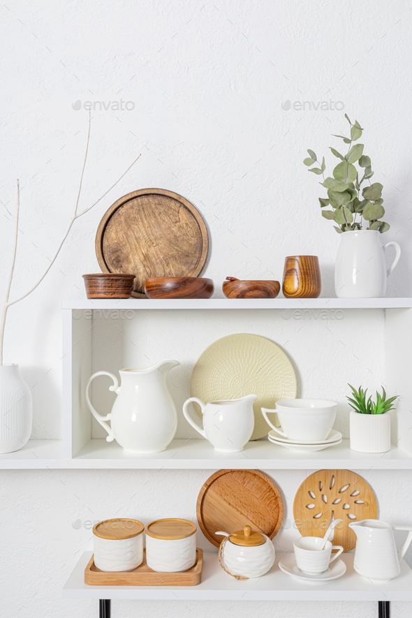 Beautiful front vertical view of the white wooden open shelves with