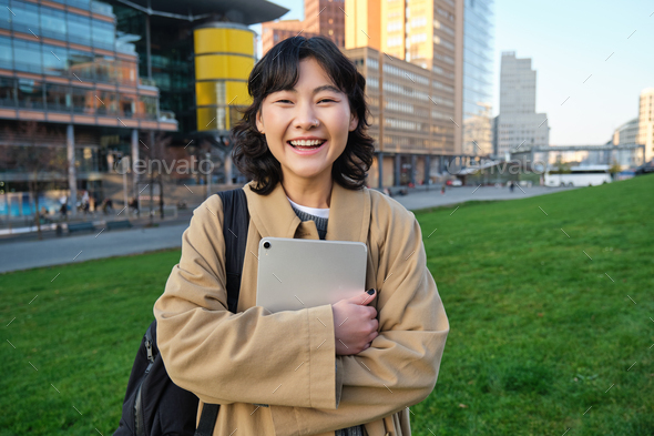 Image Of Korean Girl With Happy Face Walks Around Town With Student