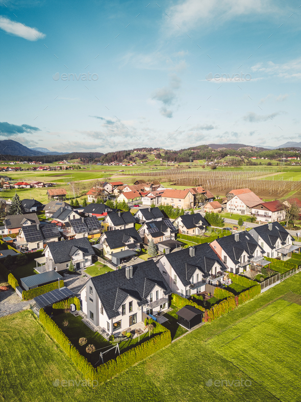 Vertical photo of family homes in duplex houses, somewhere in the countryside